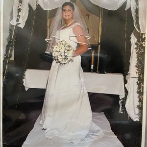 Wedding dress- only worn once - has been archived sealed